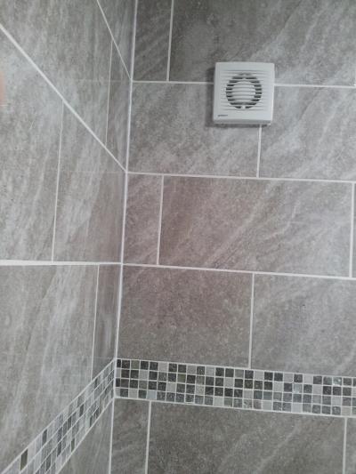 Brick Bond Pattern Bathroom Tiling and Mosaic Border. Boldre, Lymington.